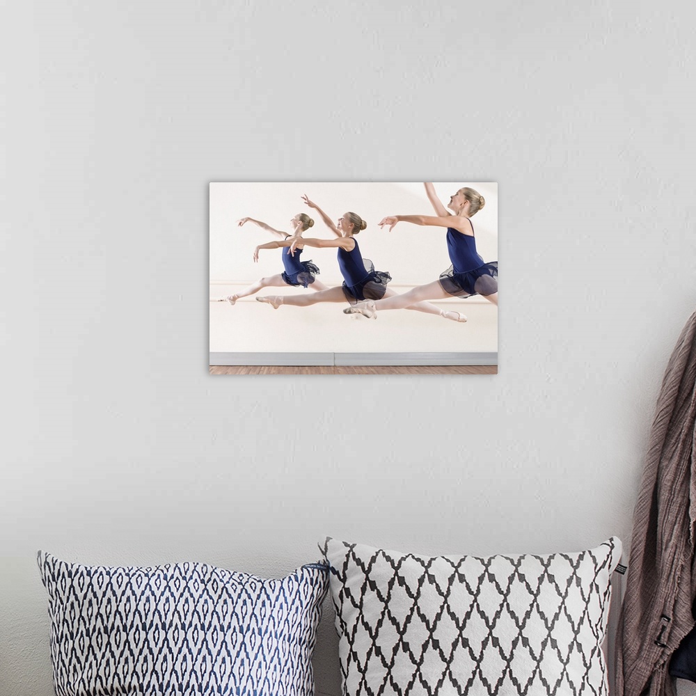 A bohemian room featuring Ballerinas leaping in midair