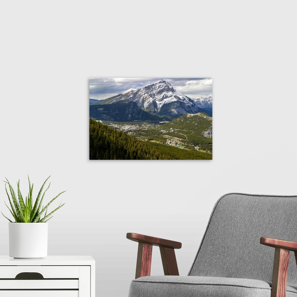 A modern room featuring Aerial view of town and Mt. Rundle, Banff, Banff National Park, Alberta, Canada