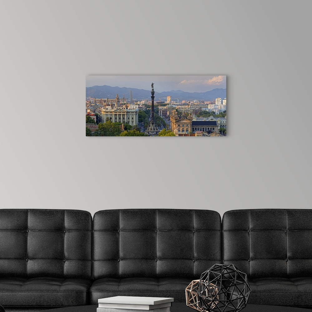 A modern room featuring Barcelona, Monument a Colom (Christopher Columbus Monument), and Skyline at sunset
