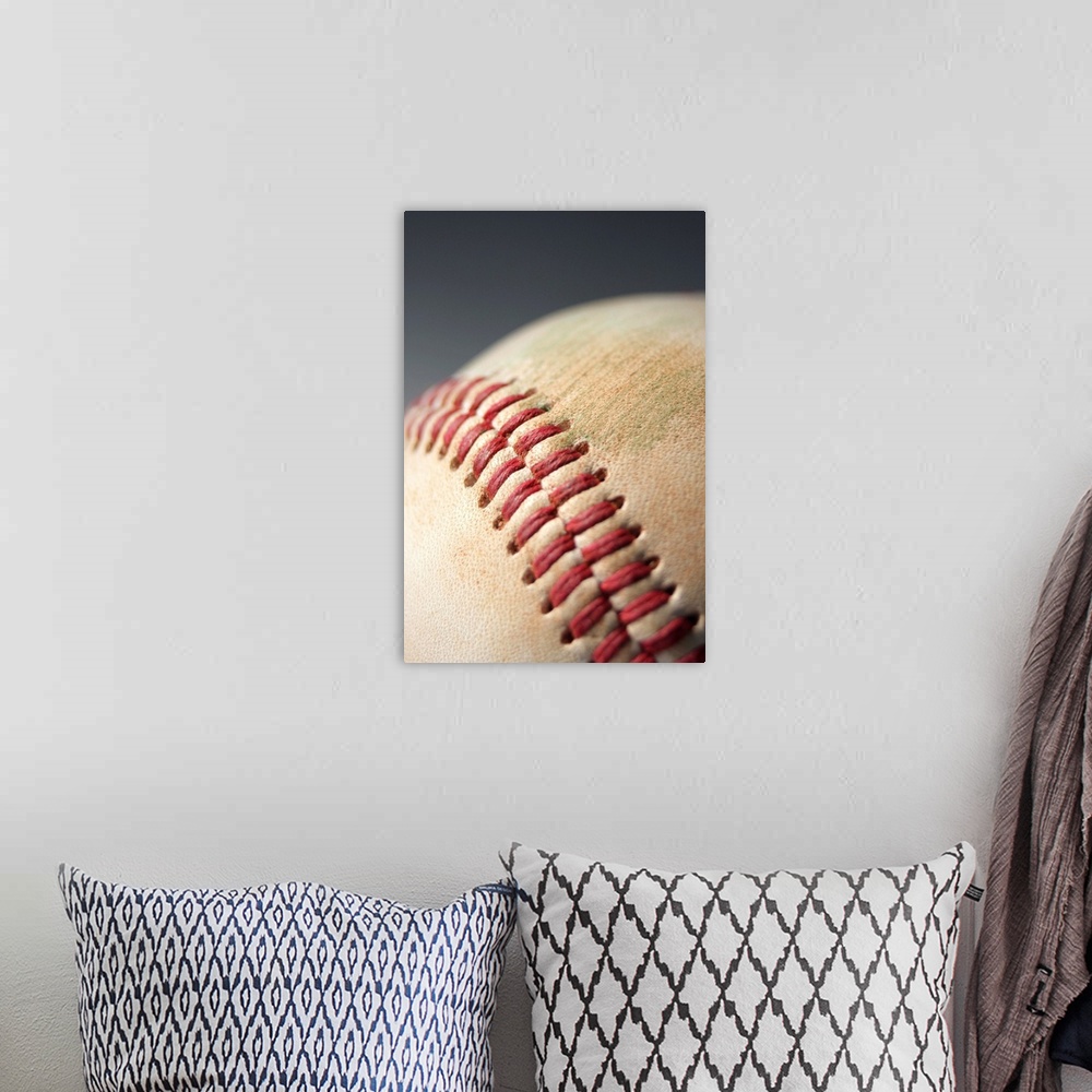 A bohemian room featuring Baseball with impact mark.