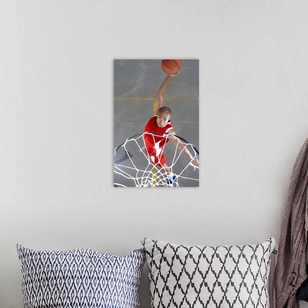 A bohemian room featuring Basketball player about to dunk