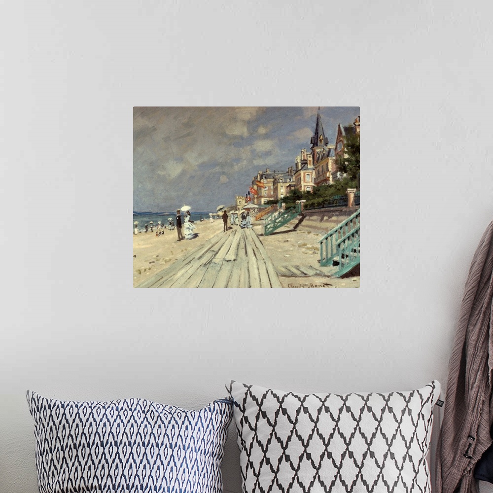A bohemian room featuring Beach At Trouville By Claude Monet