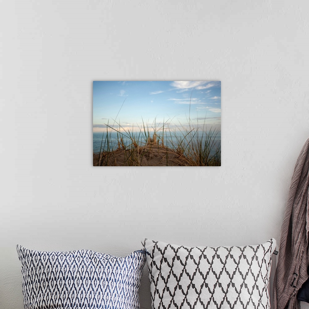 A bohemian room featuring Beach grass at the top of a sand dune at Long Point Provincial Park with Lake Erie shown in the b...
