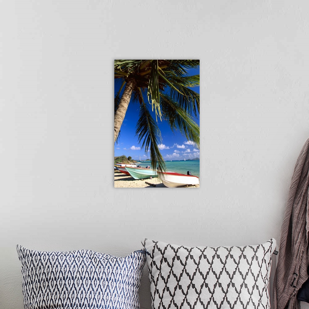 A bohemian room featuring Beached fishing boats on tropical beach