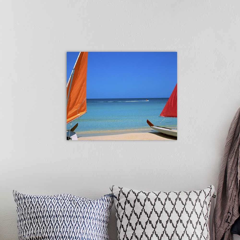 A bohemian room featuring Beached sailboats