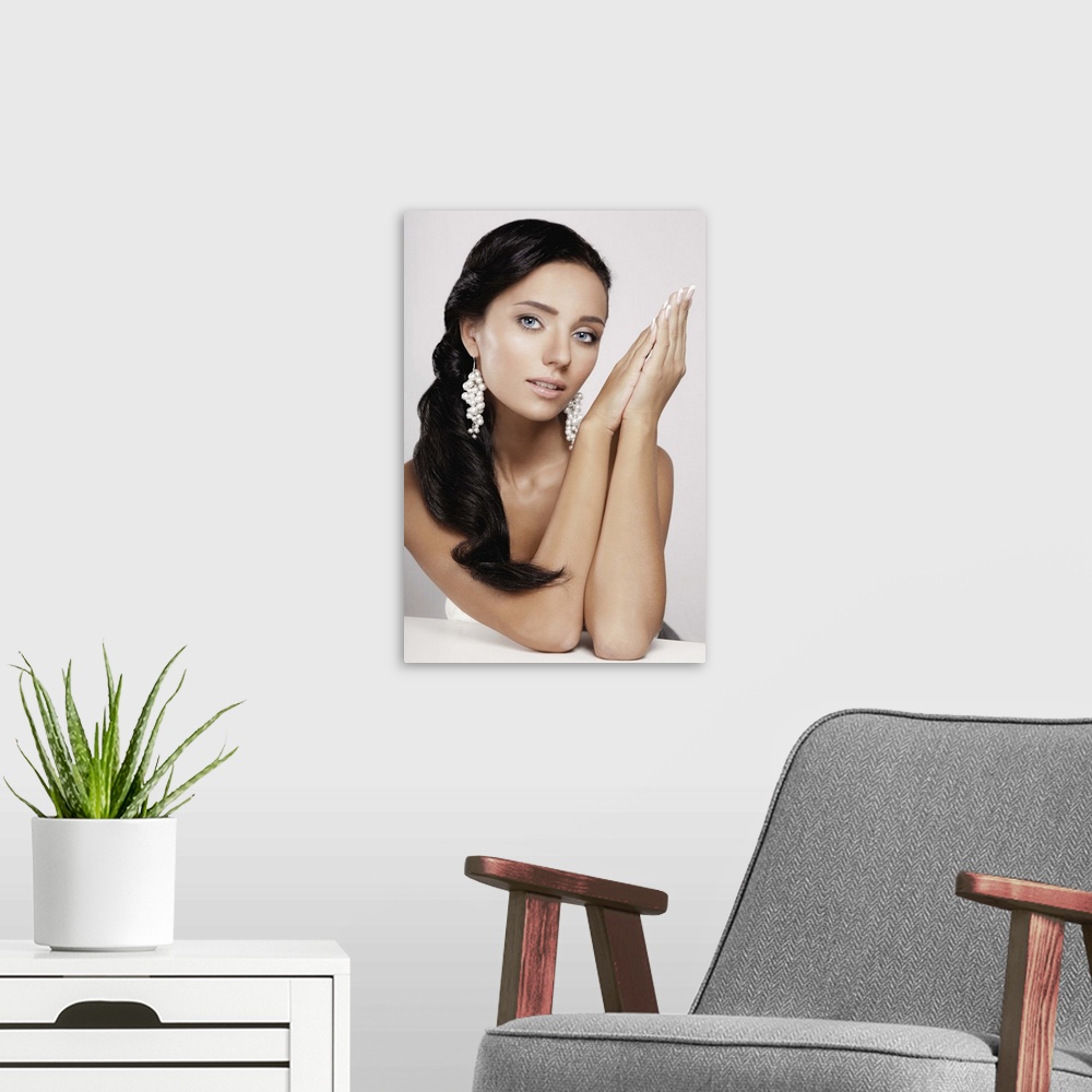 A modern room featuring Beautiful young woman, professional hairstyle and make-up