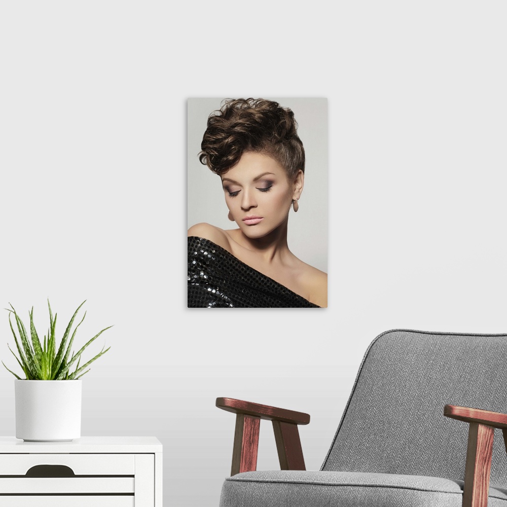 A modern room featuring Beauty portrait of young woman, professional make-up and hairstyle