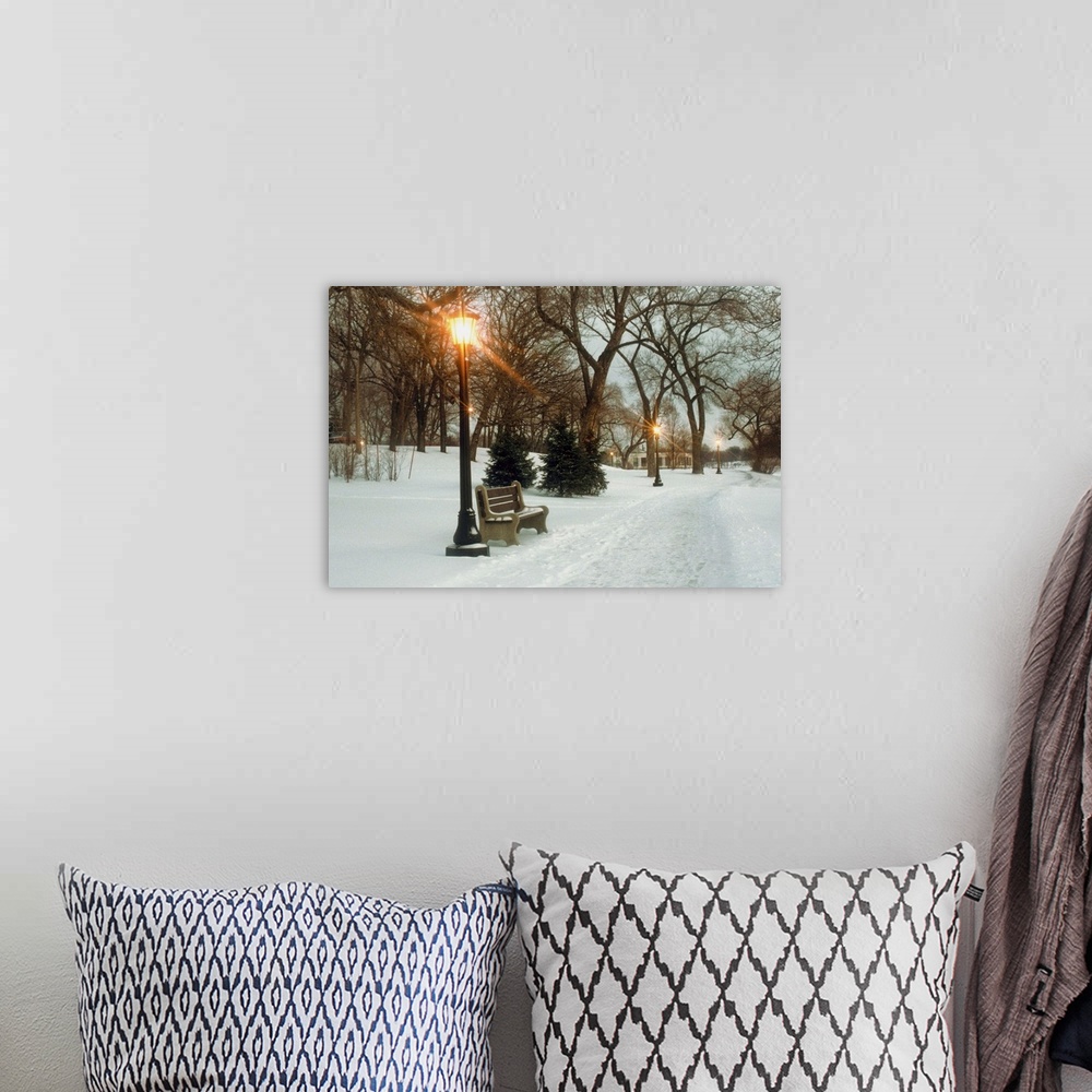 A bohemian room featuring Bench with streetlamp near snow-covered road, Lake Como Park, Saint Paul, Minnesota, USA