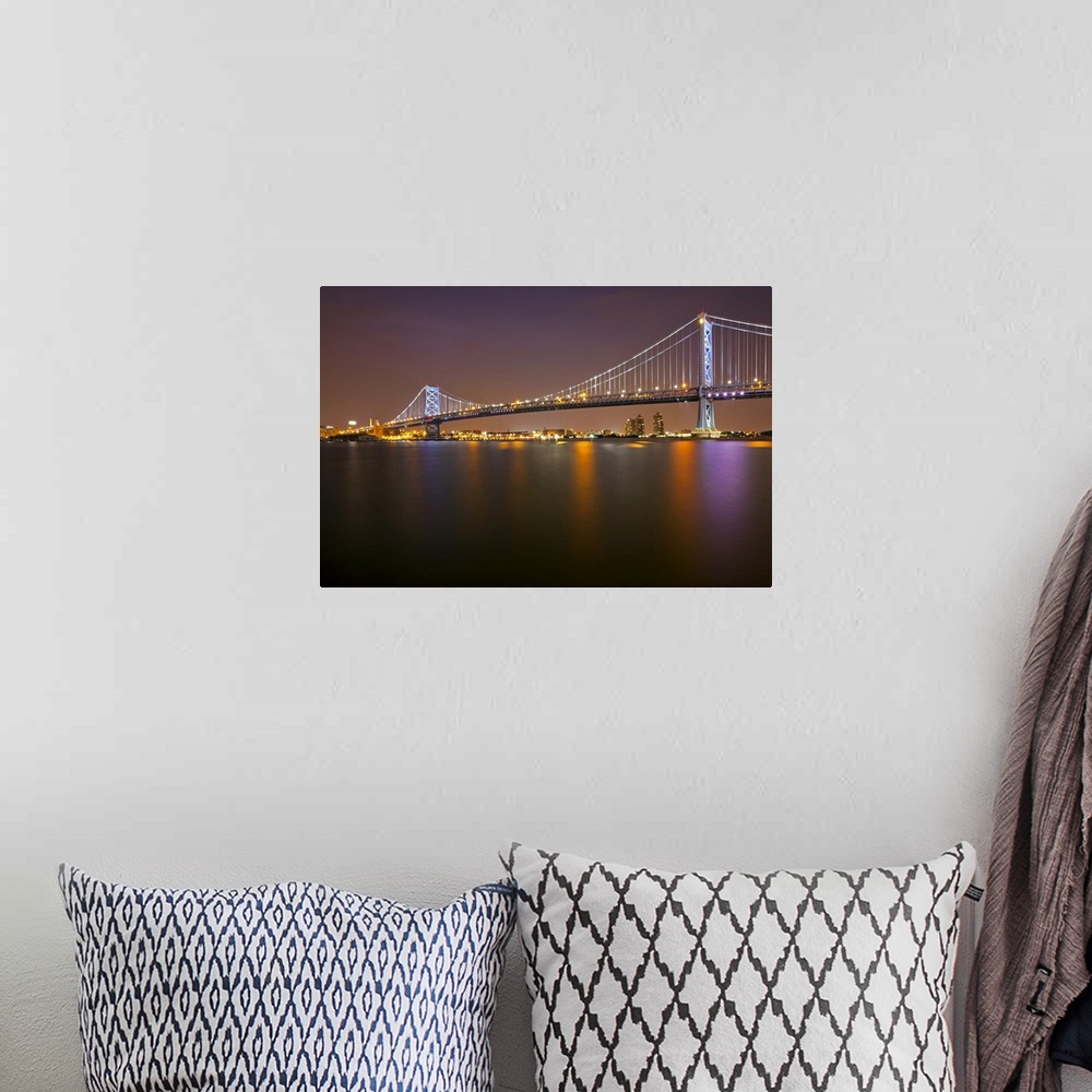 A bohemian room featuring Benjamin Franklin bridge, which spans across Delaware river from Camden, New Jersey to Philadelphia.