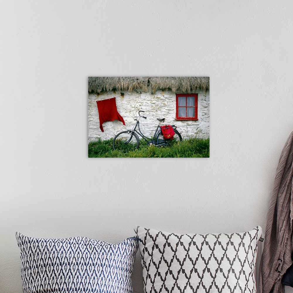 A bohemian room featuring Bicycle outside a cottage, Cregnesh, Isle of Man, British Isles