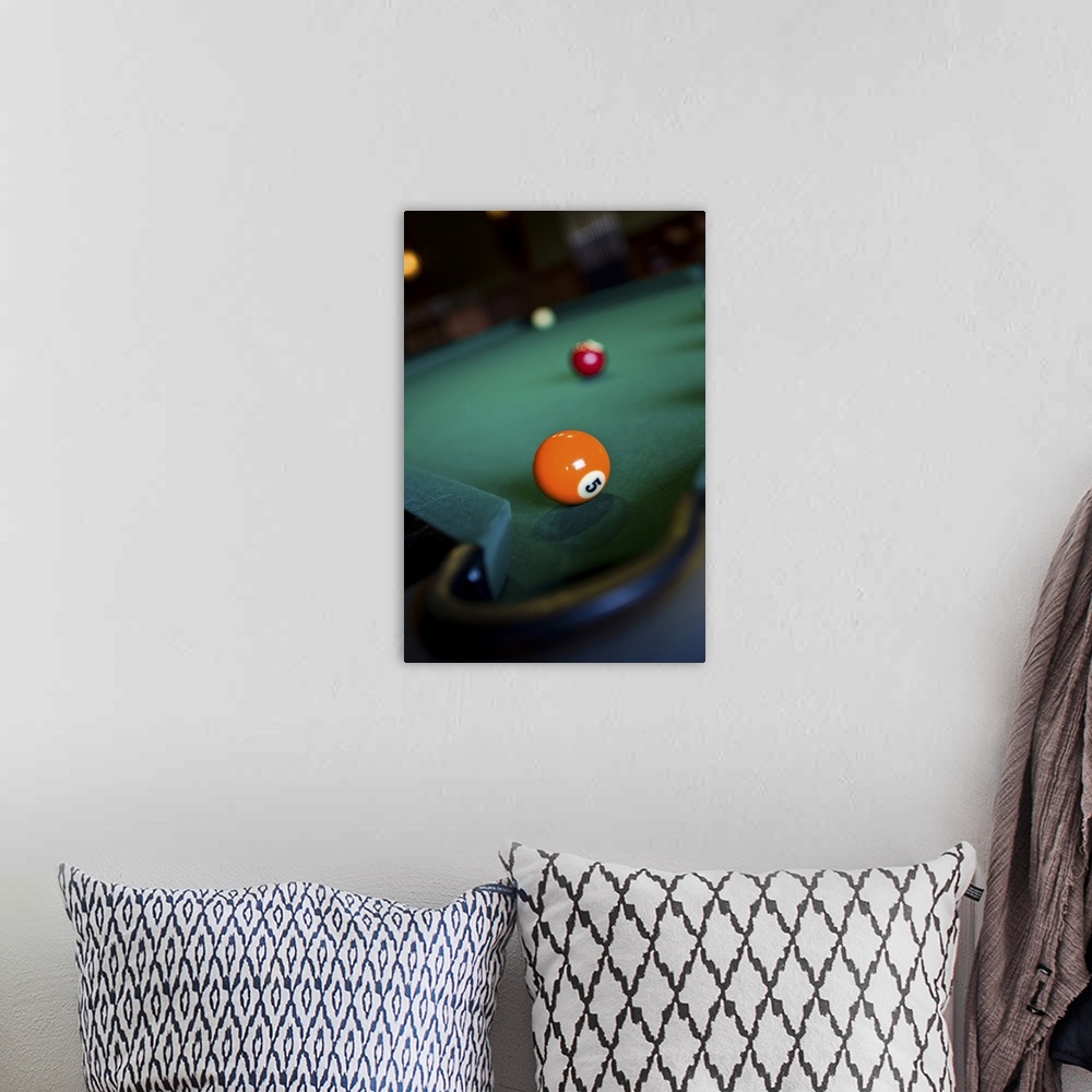A bohemian room featuring Billiards balls on table