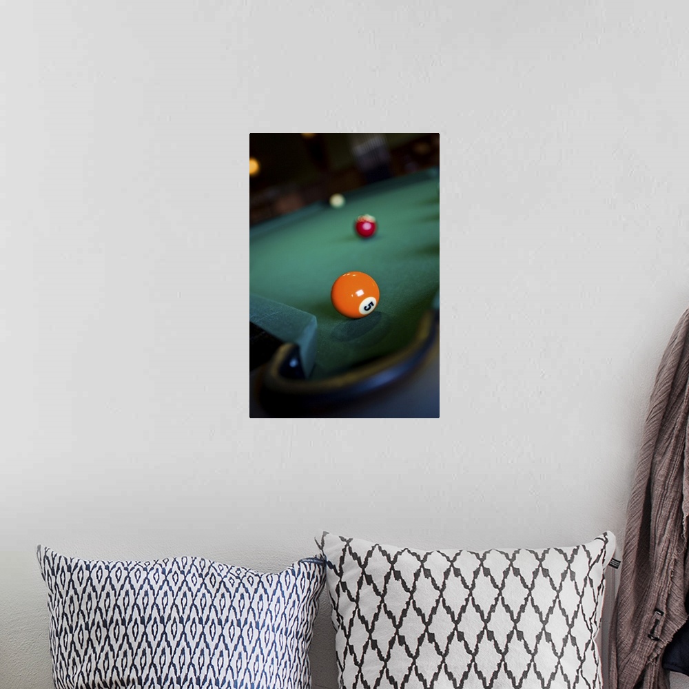 A bohemian room featuring Billiards balls on table