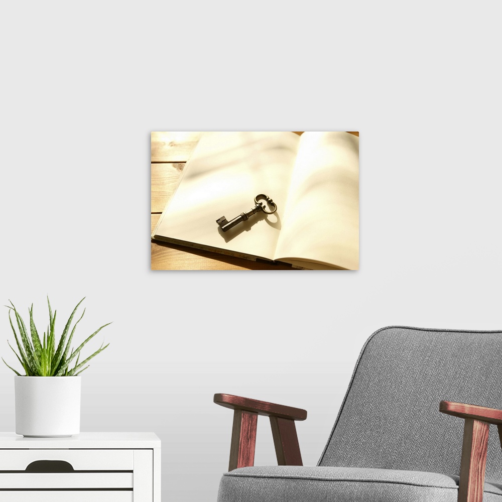A modern room featuring Blank note pad and antique key