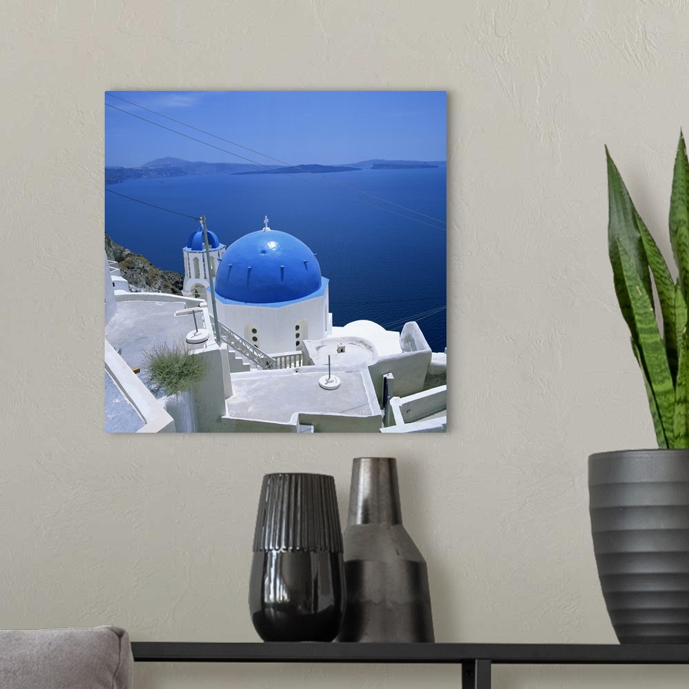 A modern room featuring Blue church dome in Imerovigli, Santorini