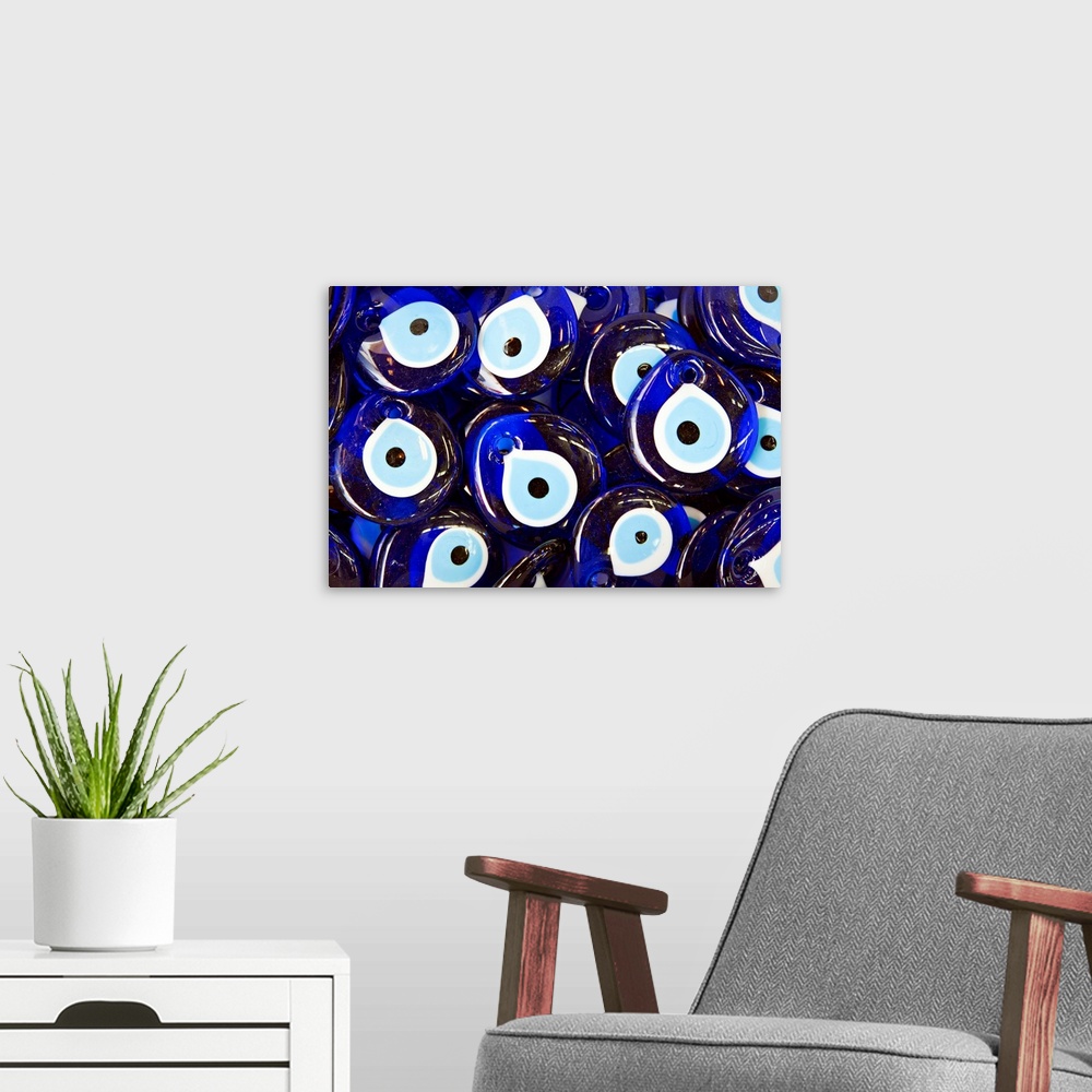A modern room featuring Blue Turkish Evil eyes ceramic beads