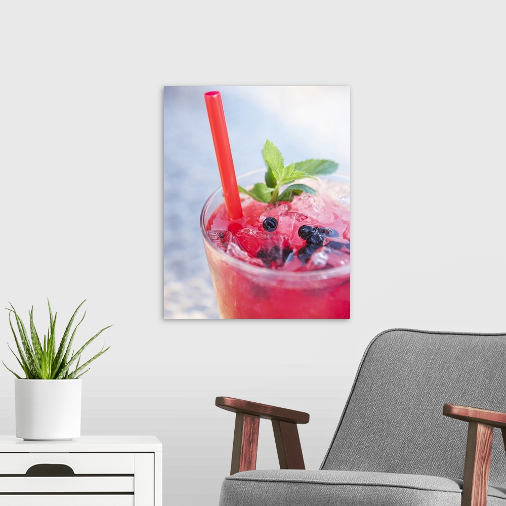 A modern room featuring Blueblueberryberry cocktail with mint, close-up