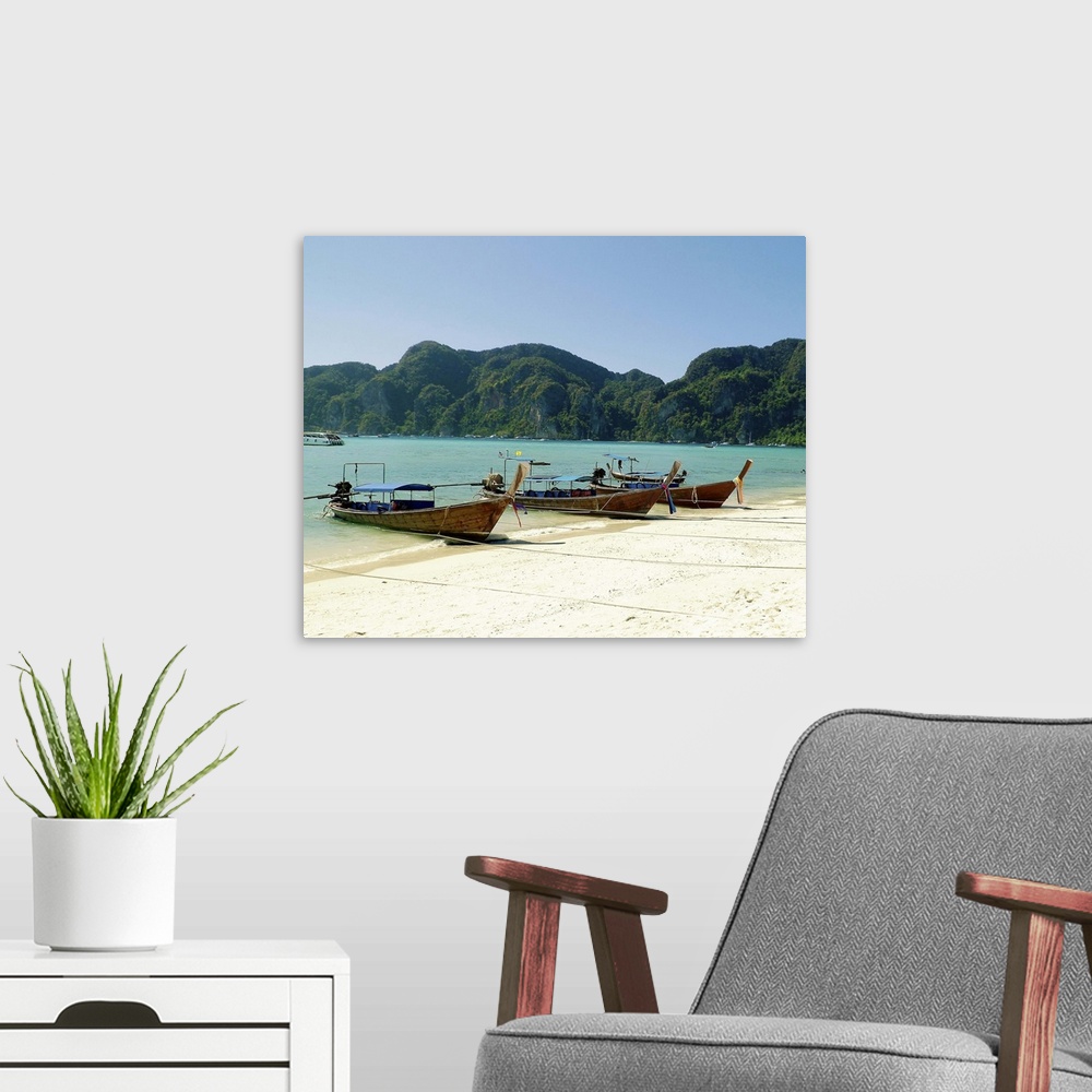 A modern room featuring Boats on beach in Thailand.