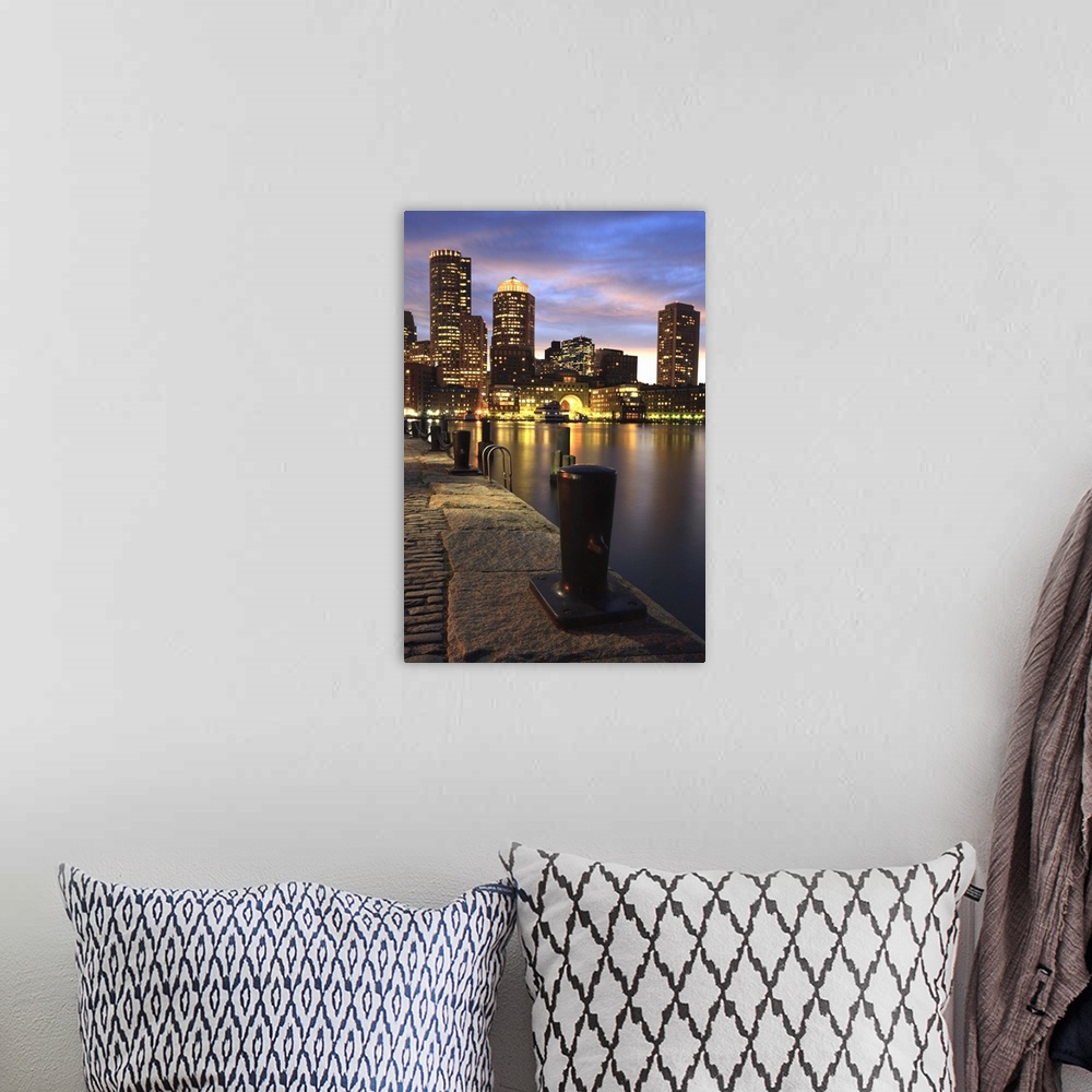 A bohemian room featuring Dramatic sunset over Boston Harbor and skyline.Boston is one of the oldest cities in the United S...
