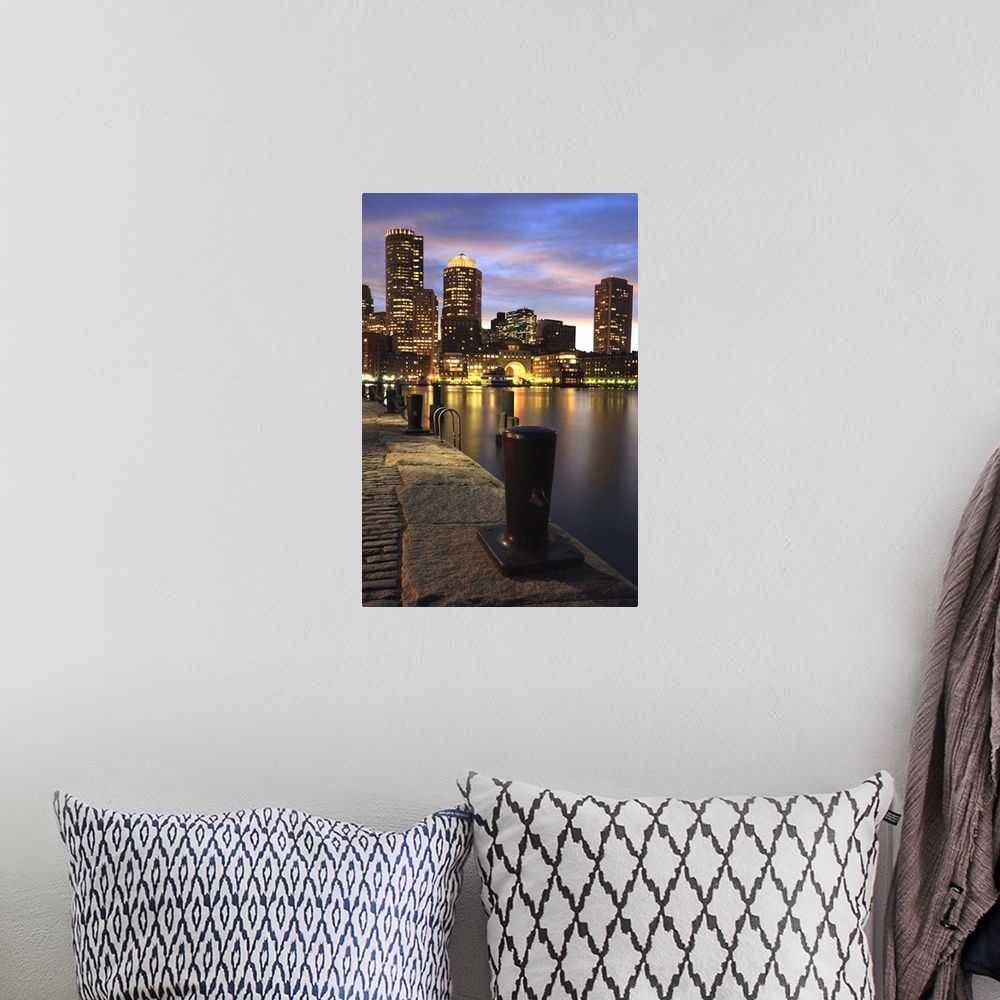 A bohemian room featuring Dramatic sunset over Boston Harbor and skyline.Boston is one of the oldest cities in the United S...