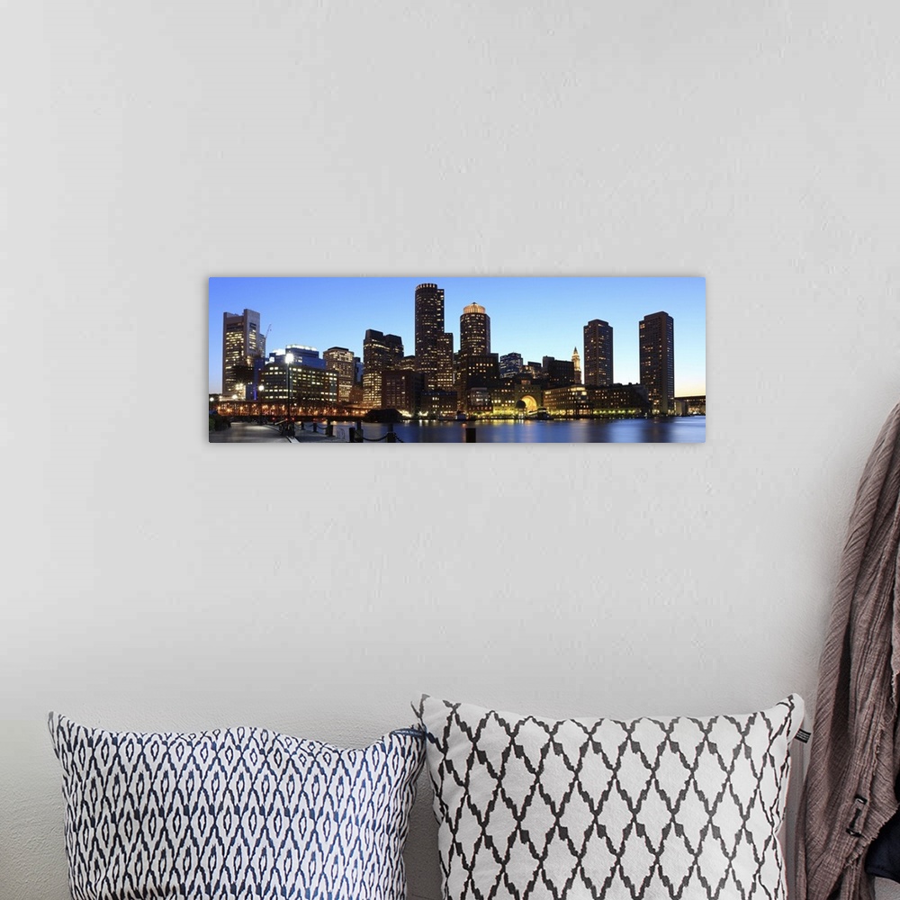 A bohemian room featuring Skyline of downtown Boston's financial district from inner Boston Harbor, at dusk