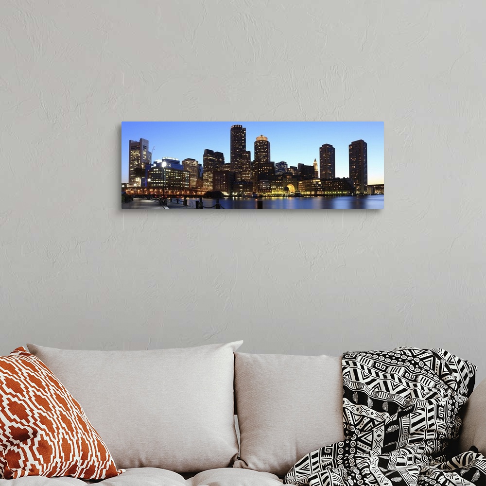 A bohemian room featuring Skyline of downtown Boston's financial district from inner Boston Harbor, at dusk