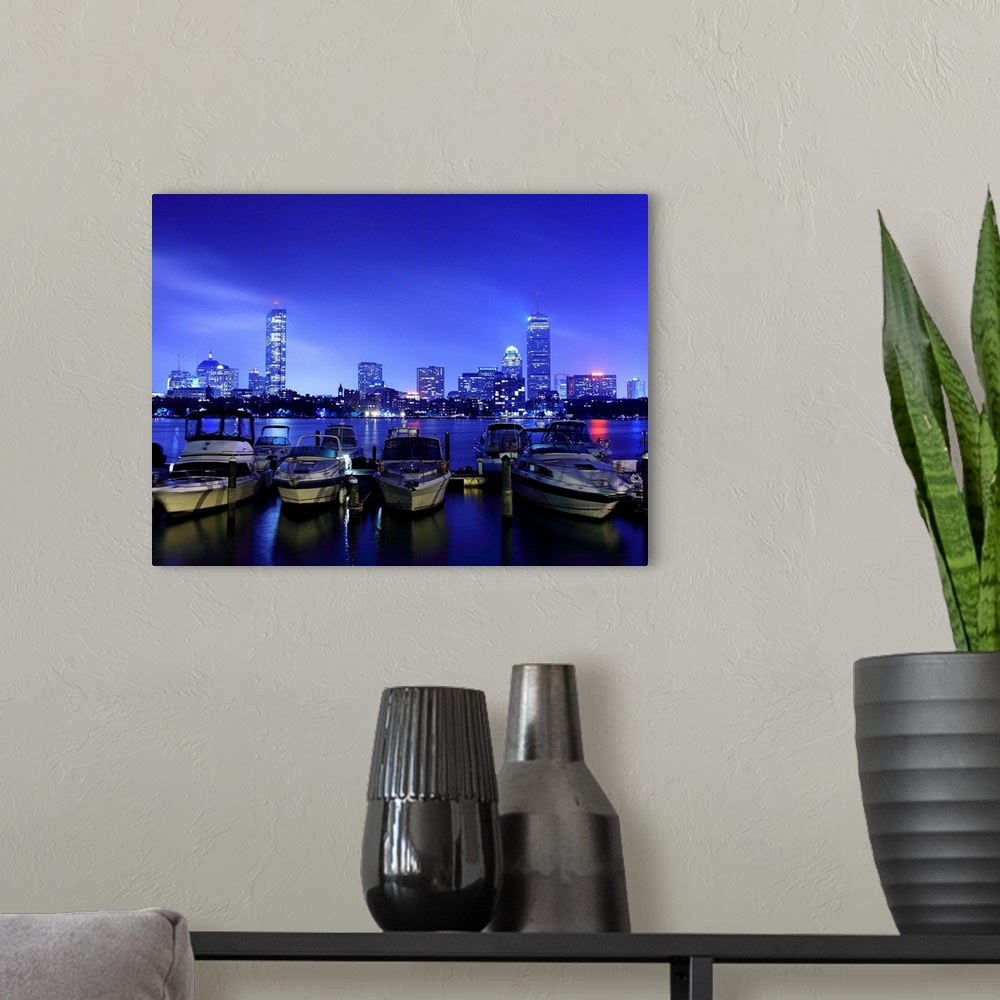 A modern room featuring Boston skyline from north side of Charles River