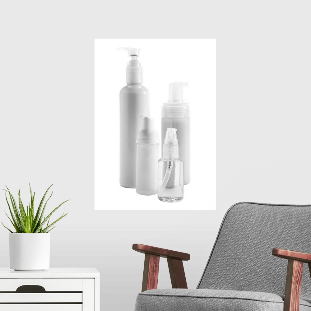A modern room featuring Bottles of skin care products on white background