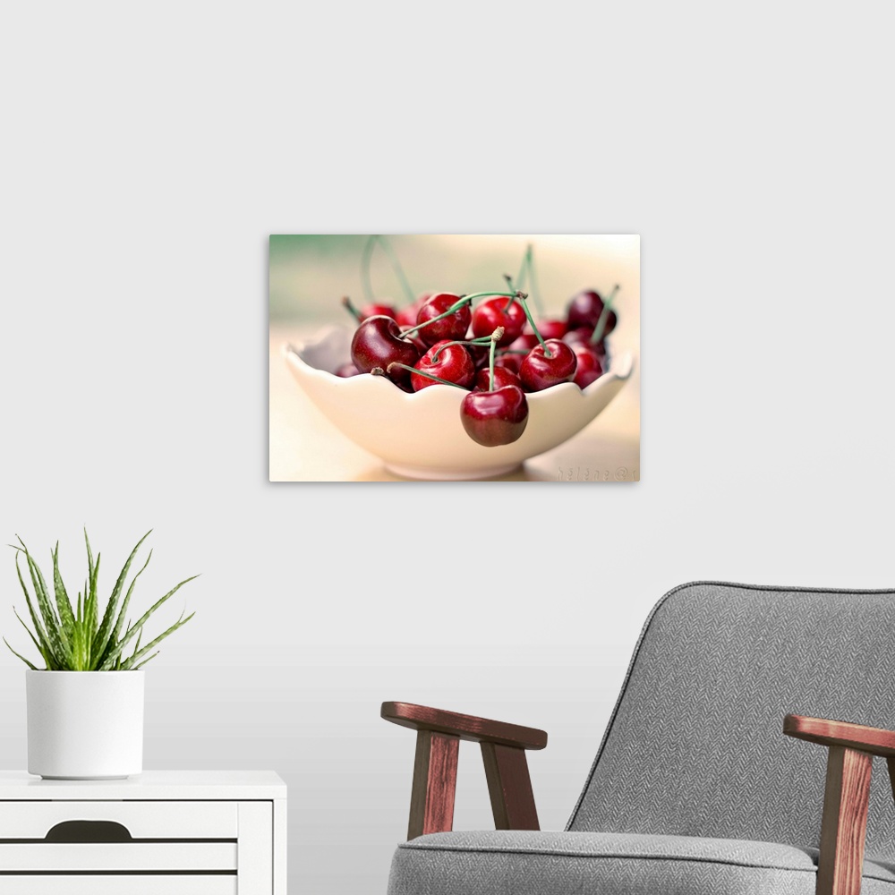 A modern room featuring Bowl of cherries.