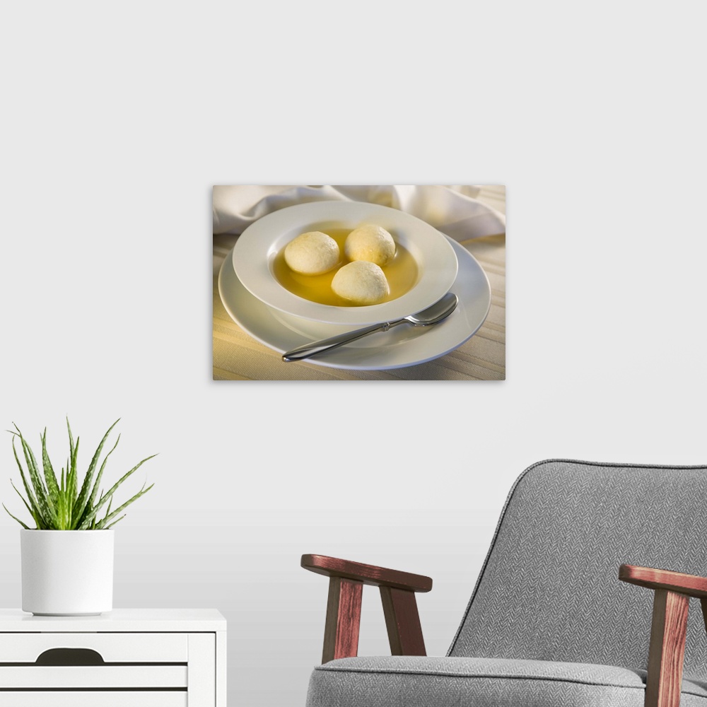 A modern room featuring Bowl of matzah ball soup