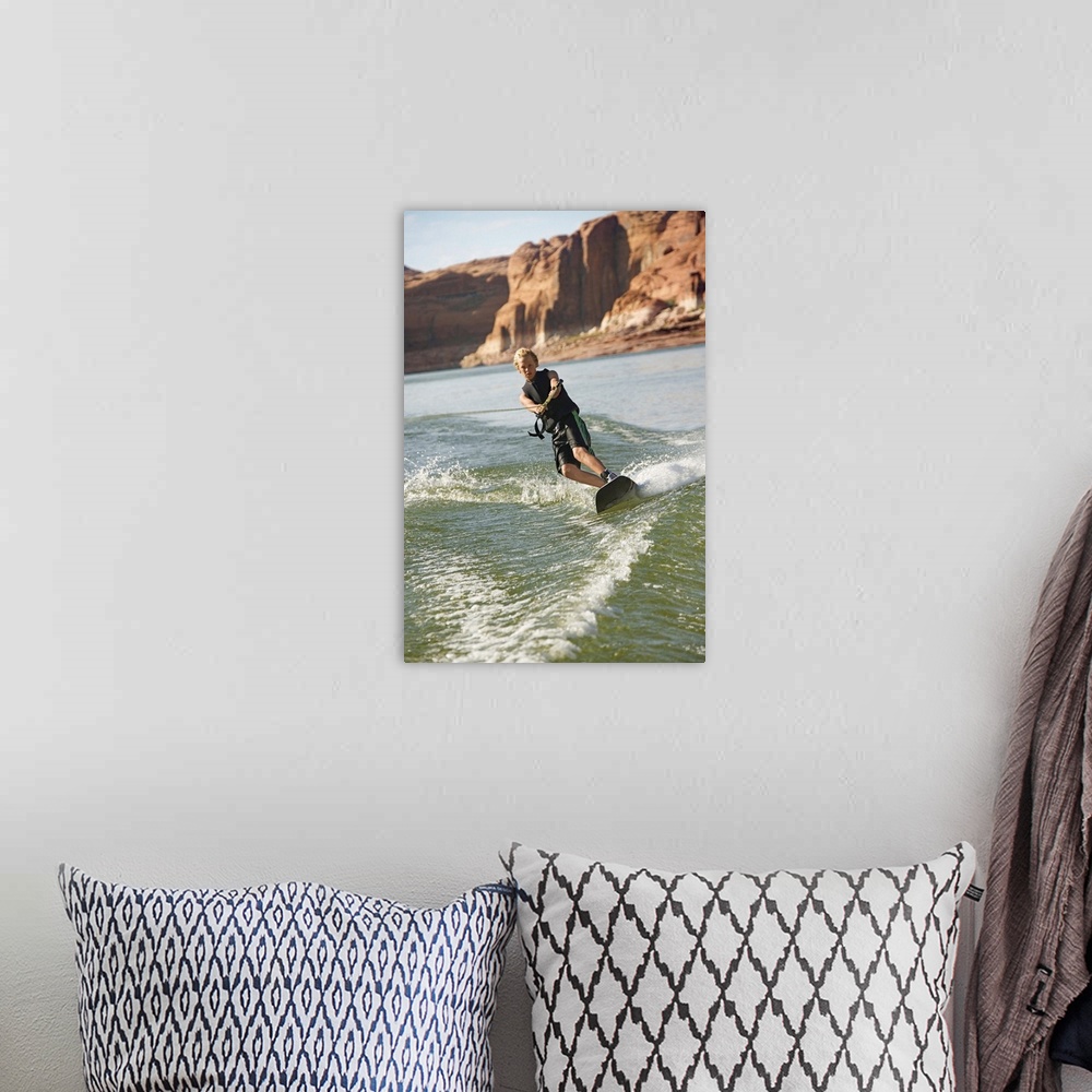A bohemian room featuring Boy wakeboarding on Lake Powell