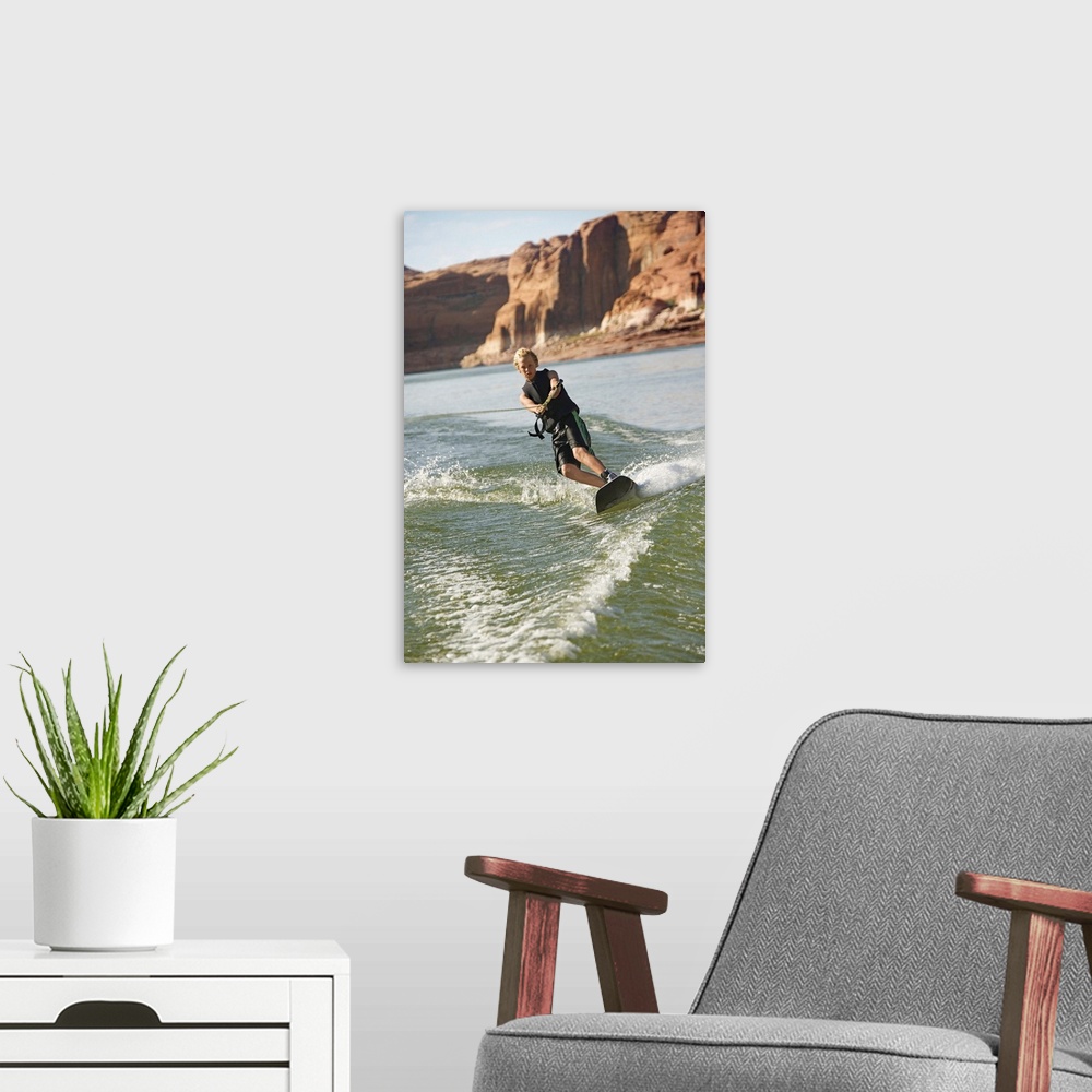 A modern room featuring Boy wakeboarding on Lake Powell