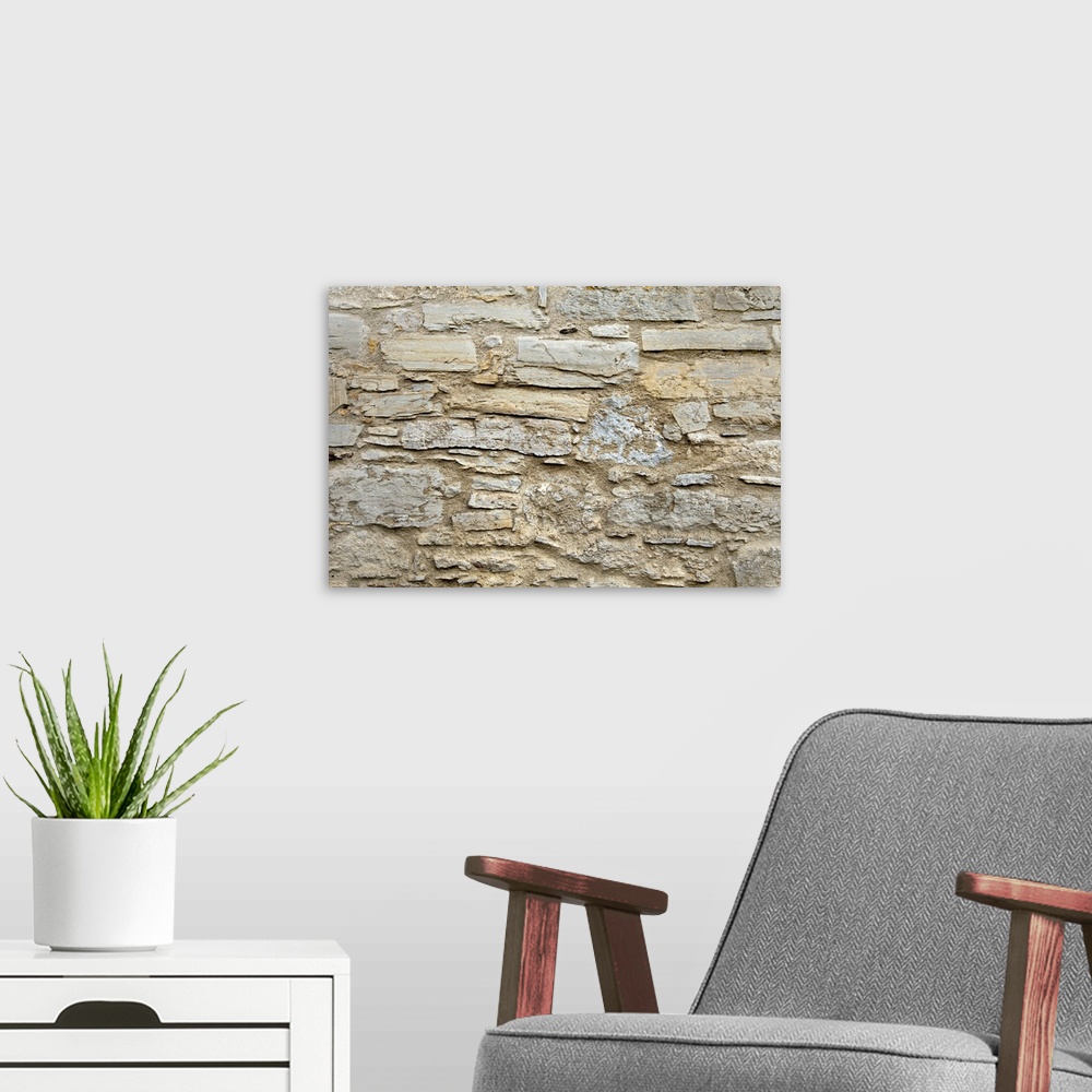 A modern room featuring Brick wall