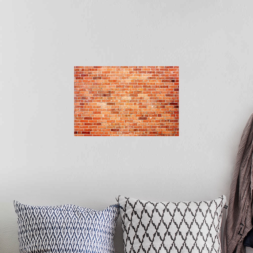 A bohemian room featuring Brick wall