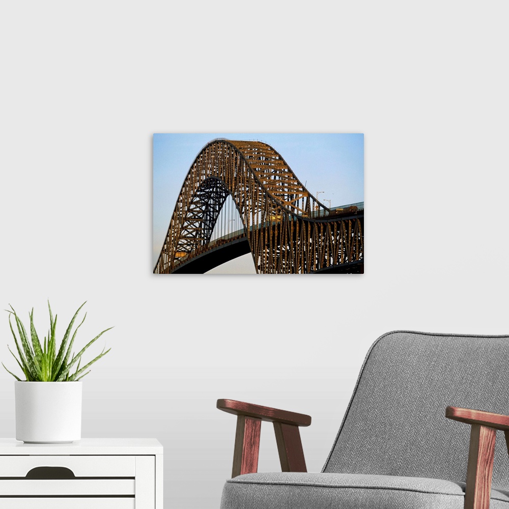 A modern room featuring The Bridge of the Americas spans the Panama Canal at Panama City.