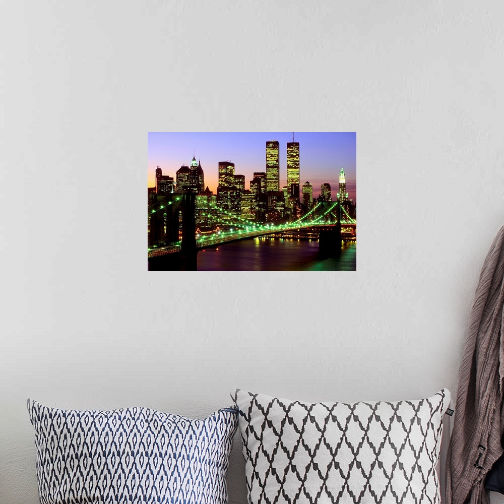 A bohemian room featuring Brooklyn Bridge and Manhattan skyline at dusk, New York