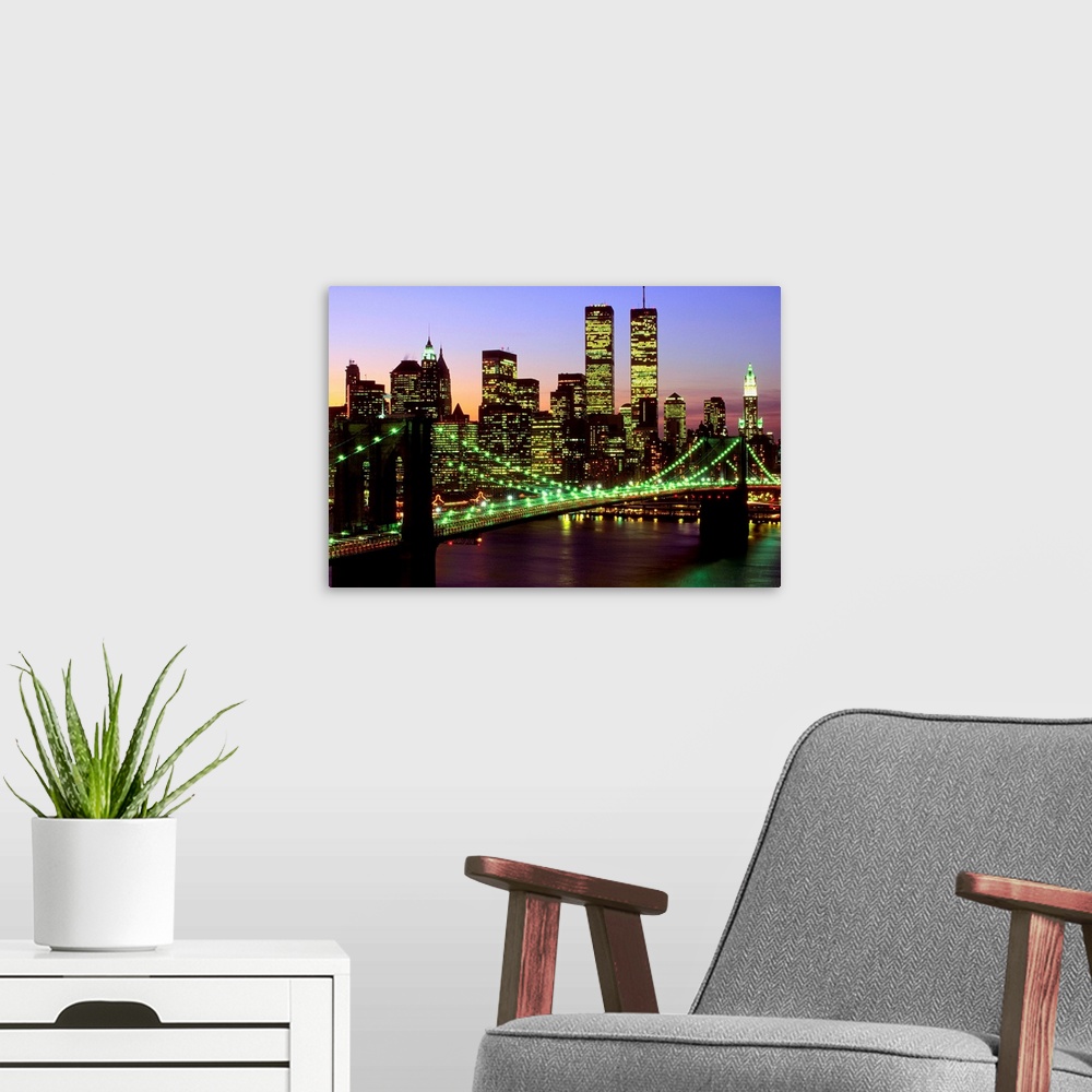 A modern room featuring Brooklyn Bridge and Manhattan skyline at dusk, New York