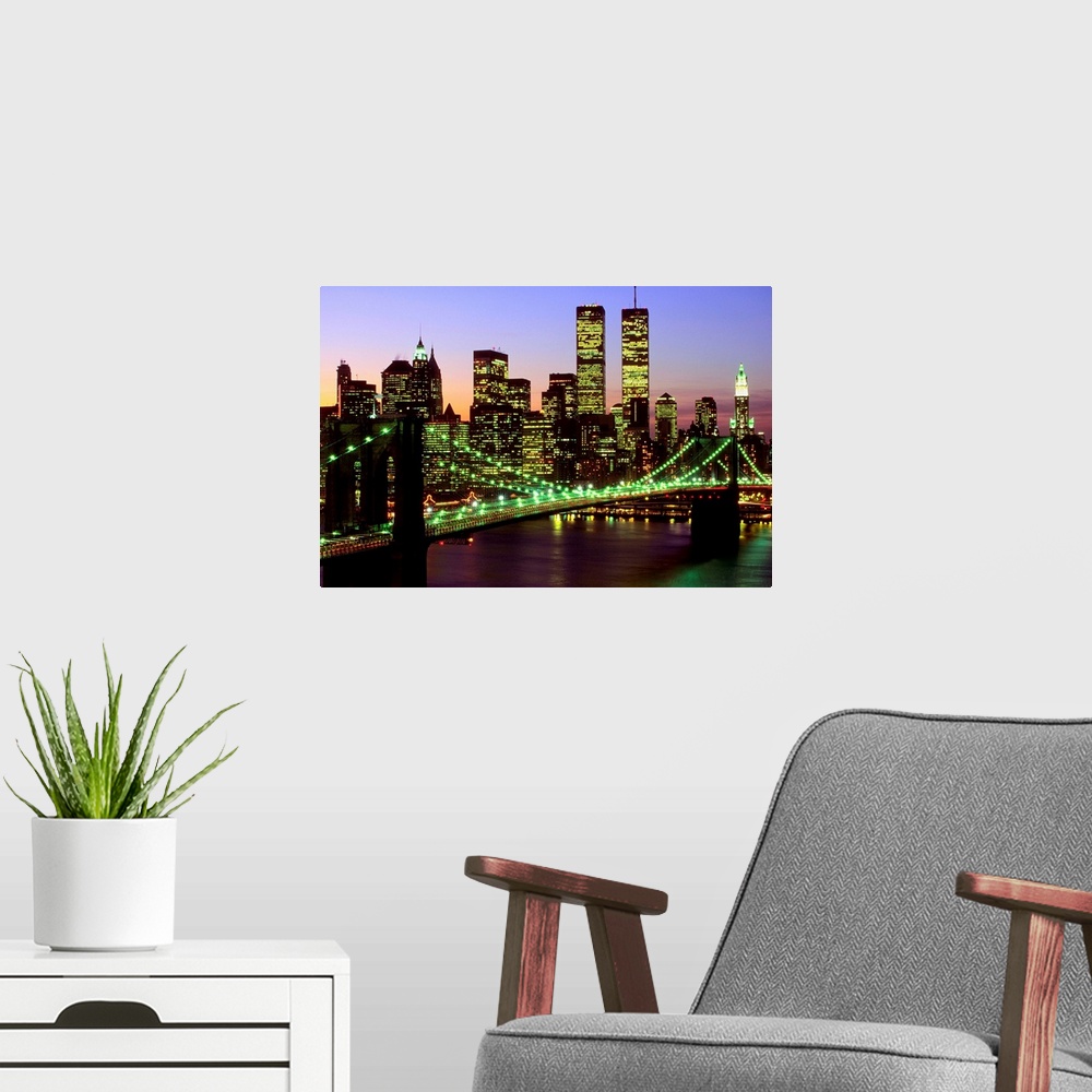 A modern room featuring Brooklyn Bridge and Manhattan skyline at dusk, New York