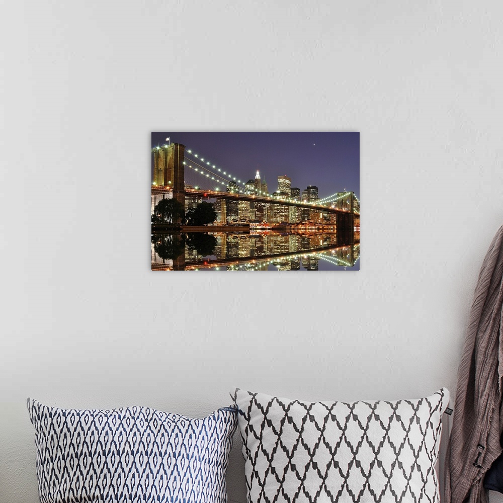 A bohemian room featuring Beautiful artwork for the home or office of the Brooklyn Bridge illuminated at night with the sky...