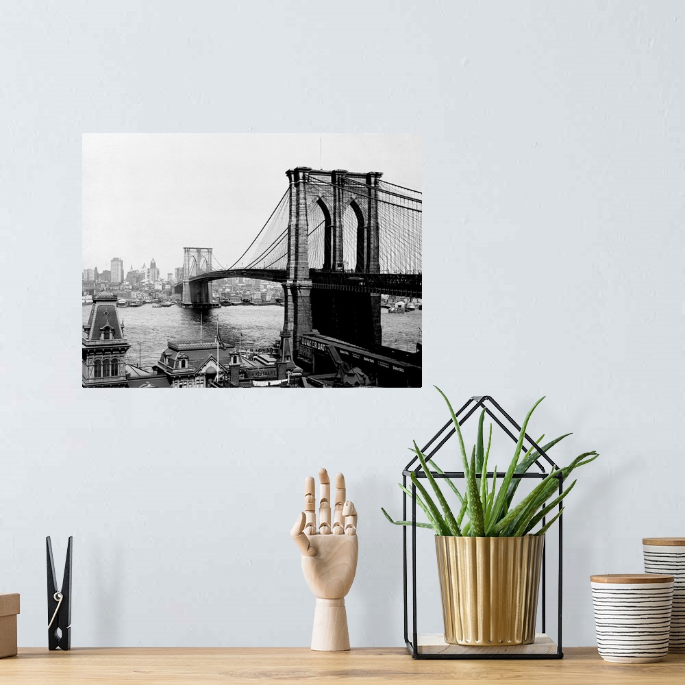 A bohemian room featuring The Brooklyn Bridge, the largest suspension bridge and the first to ever be built with steel, spa...