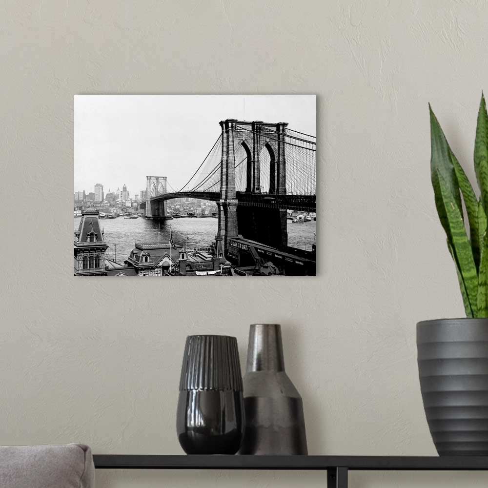 A modern room featuring The Brooklyn Bridge, the largest suspension bridge and the first to ever be built with steel, spa...