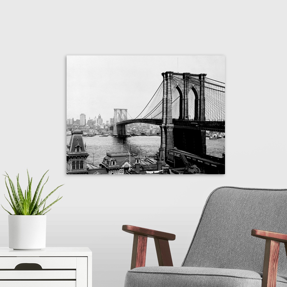 A modern room featuring The Brooklyn Bridge, the largest suspension bridge and the first to ever be built with steel, spa...