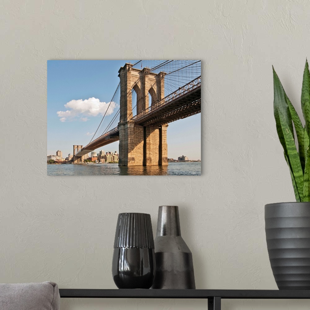 A modern room featuring Brooklyn Bridge seen in lower Manhattan waterfront, New York.