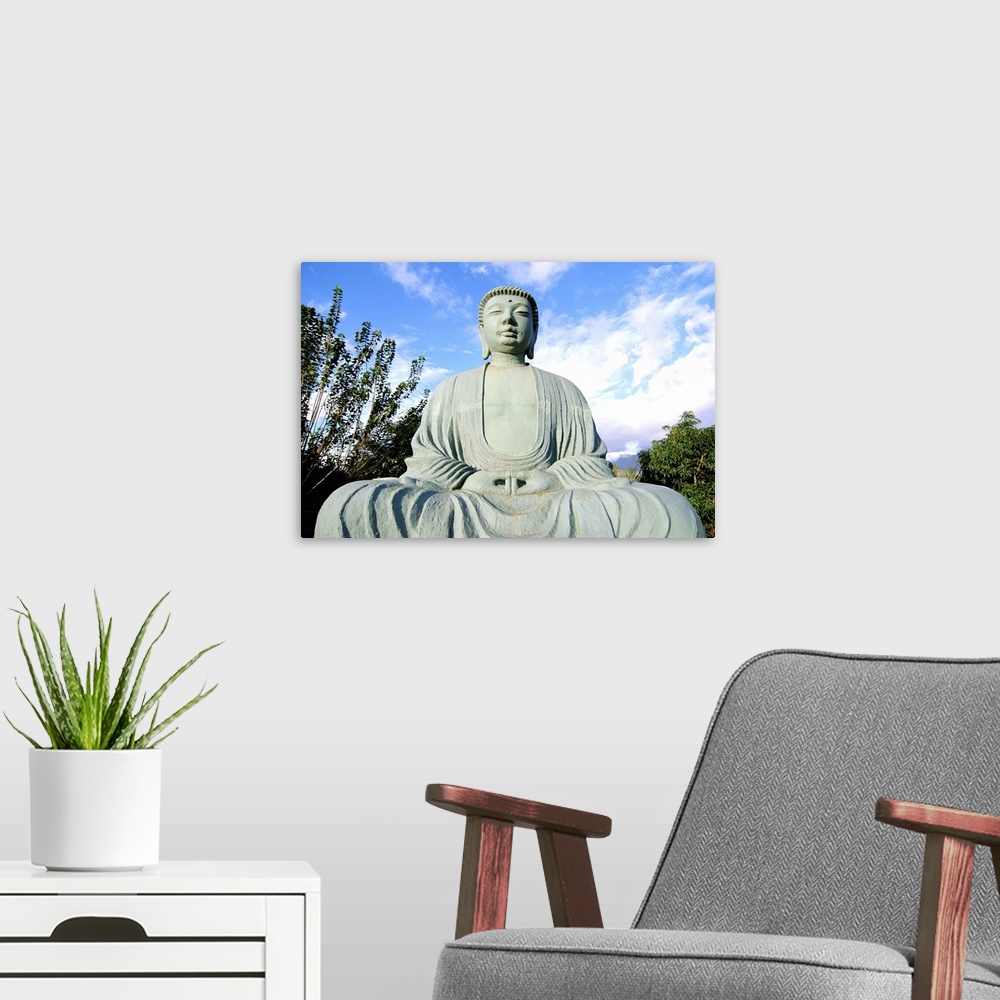 A modern room featuring Buddha statue