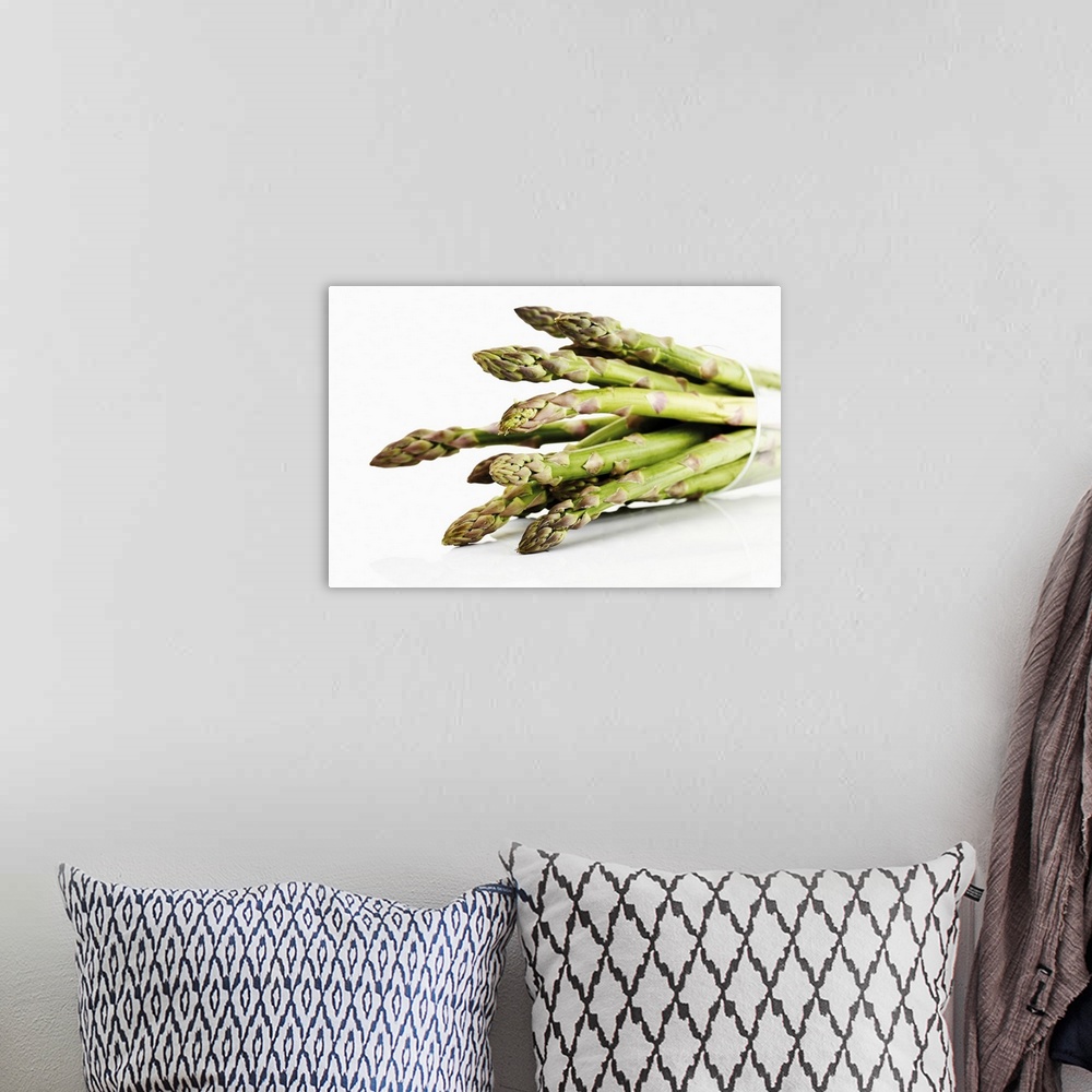 A bohemian room featuring Bunch of asparagus in beaker, close-up