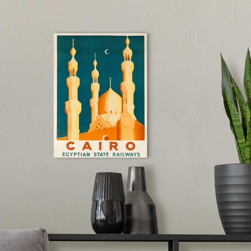 A modern room featuring 1930s Ciaro Egypt travel poster showing golden Mosques and minarets in the moonlight