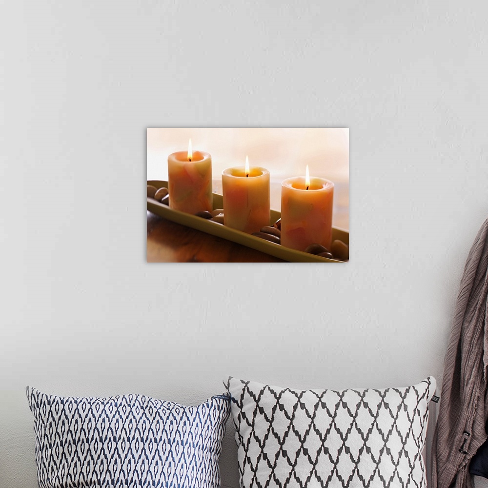 A bohemian room featuring Candles burning