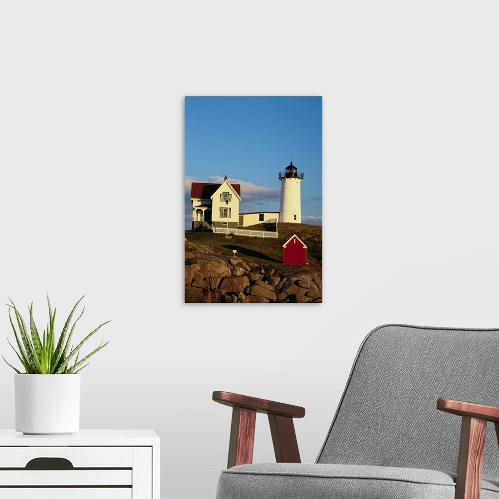 A modern room featuring Cape Neddick Lighthouse