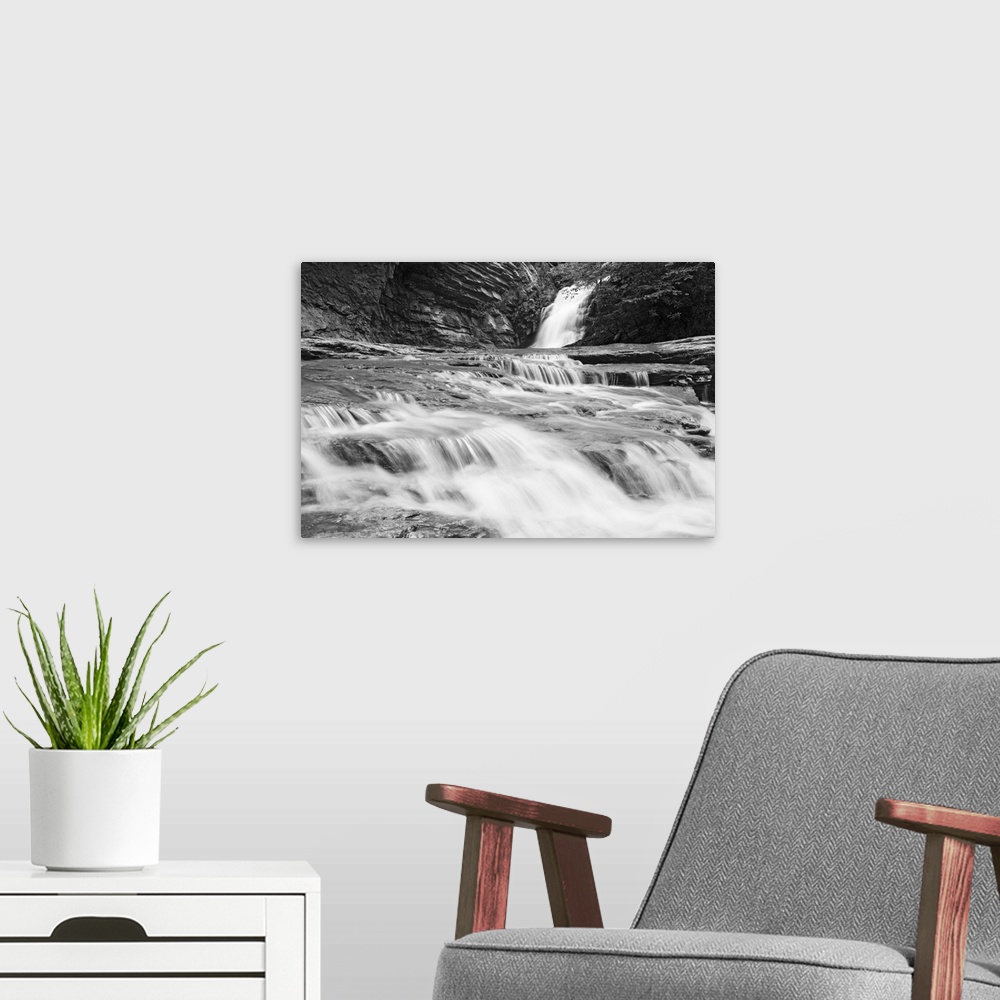 A modern room featuring Cascades flow from Lower Cascades Falls at Hanging Rock State Park.