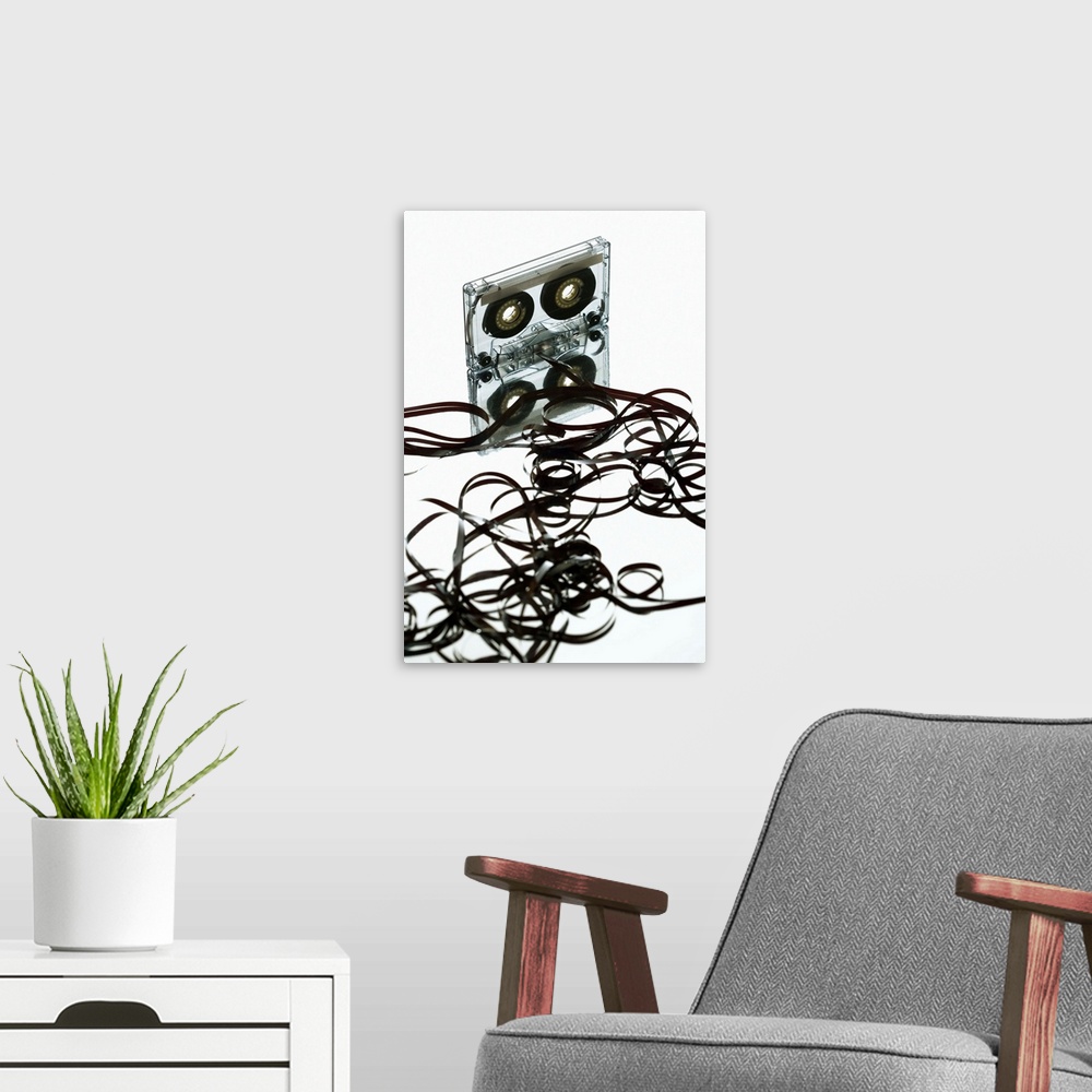 A modern room featuring Cassette tape on mirror unraveling