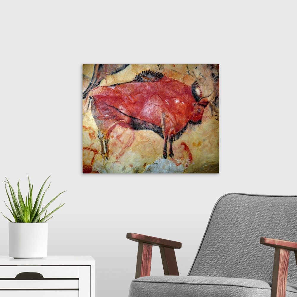 A modern room featuring Painting of a bison in the cave of Altamira, Spain.